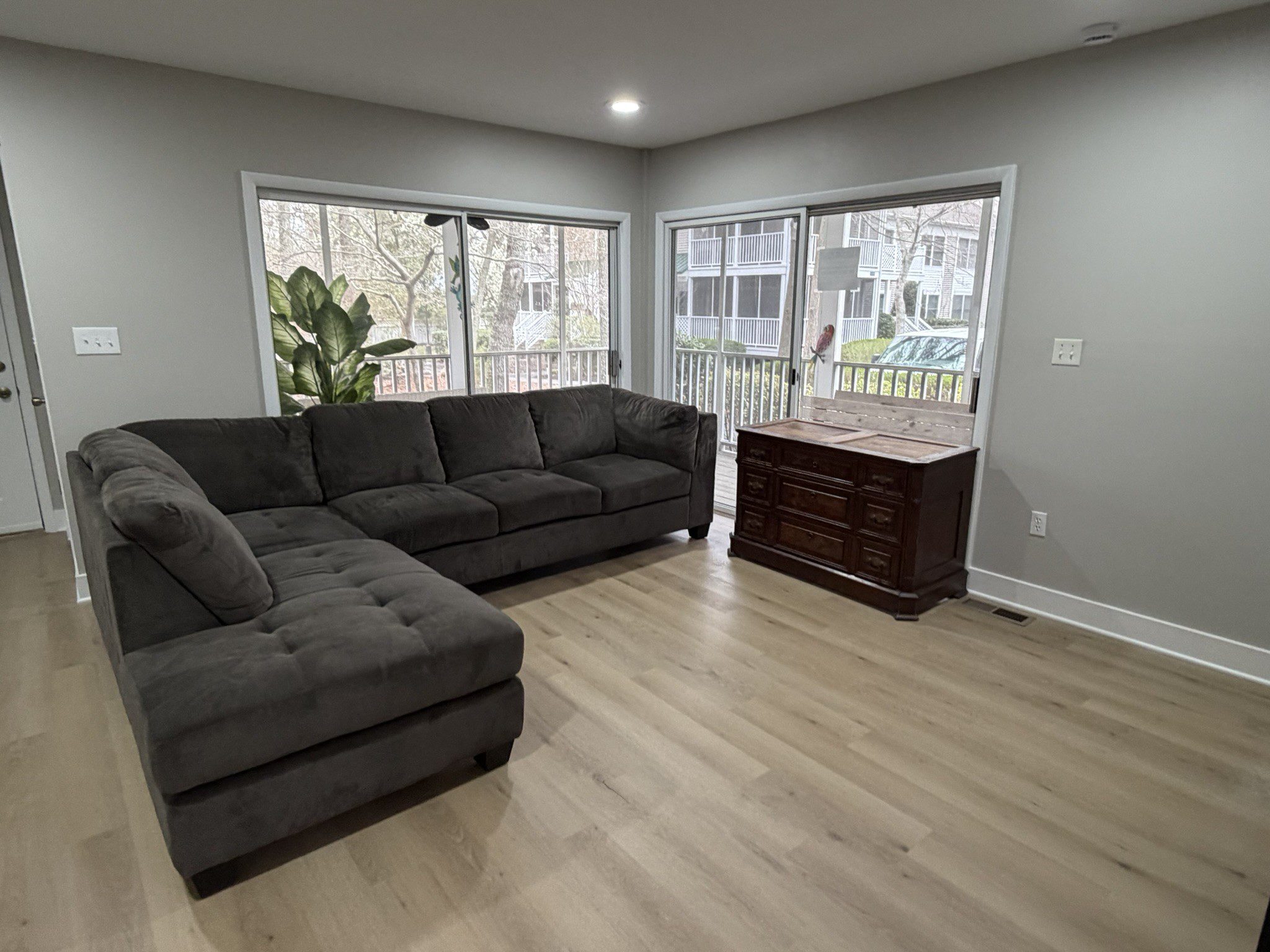 Modern living room with gray sectional sofa